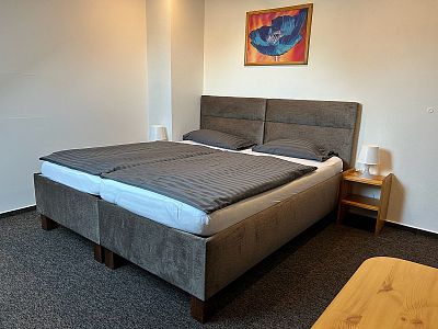 Čtyři plně vybavené podkrovní pokoje